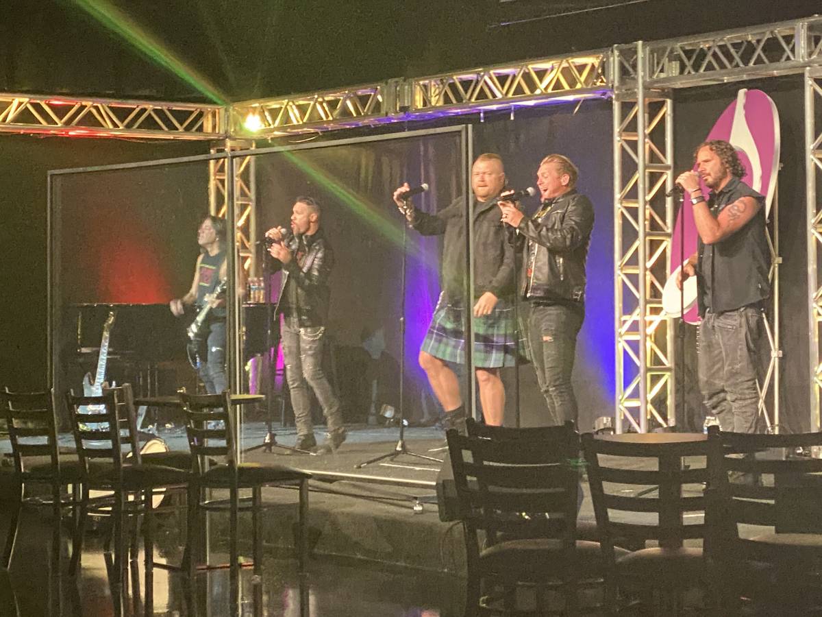 The Tenors of Rock are shown behind plexiglass at Notoriety on Sunday, July 5, 2020. (John Kats ...