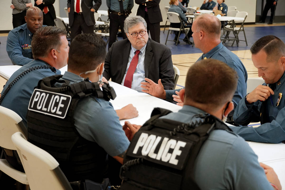 FILE - In this Aug. 19, 2020, photo Attorney General William Barr participates in a roll call w ...