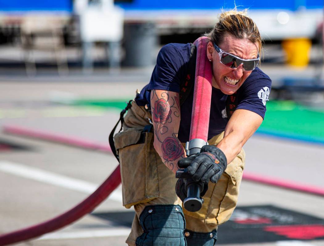 Las Vegas firefighter Jacqueline Palmer, former world champion, participates in a run-through o ...