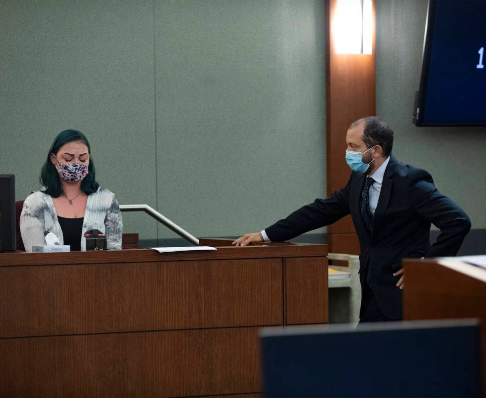 Prosecutor Christopher Hamner, right, cross-examines Alisha Burns, left, during an evidentiary ...
