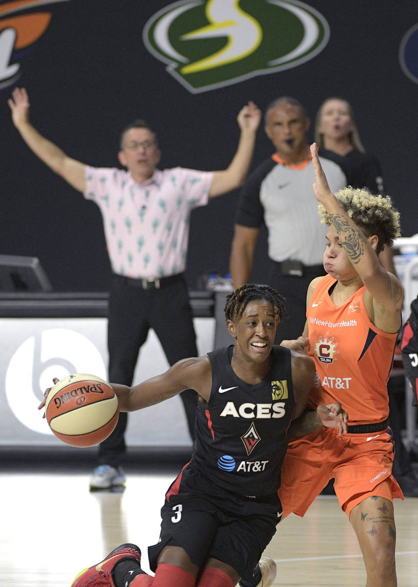 Las Vegas Aces guard Danielle Robinson (3) drives to the lane while defended by Connecticut Sun ...