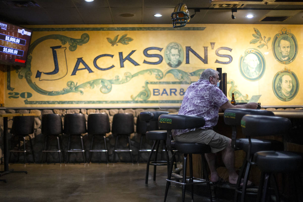 Jim Yerardi of Las Vegas sits down for a beer and a meal at Jackson's Bar and Grill in the earl ...