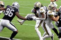 New Orleans Saints running back Alvin Kamara (41) scores a touchdown against the Las Vegas Raid ...