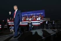 President Donald Trump holds a campaign rally at the Minden-Tahoe Airport in Nevada on Saturday ...
