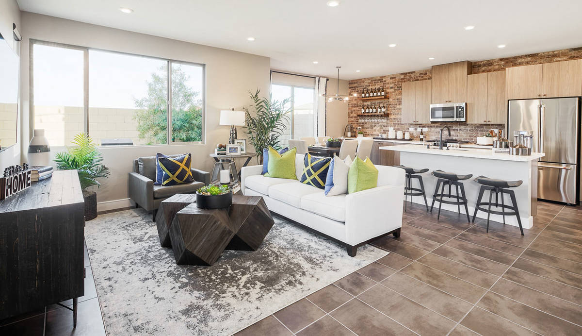 The Plan Two model in Pardee’s gated Evolve town home community is fully furnished, landscape ...