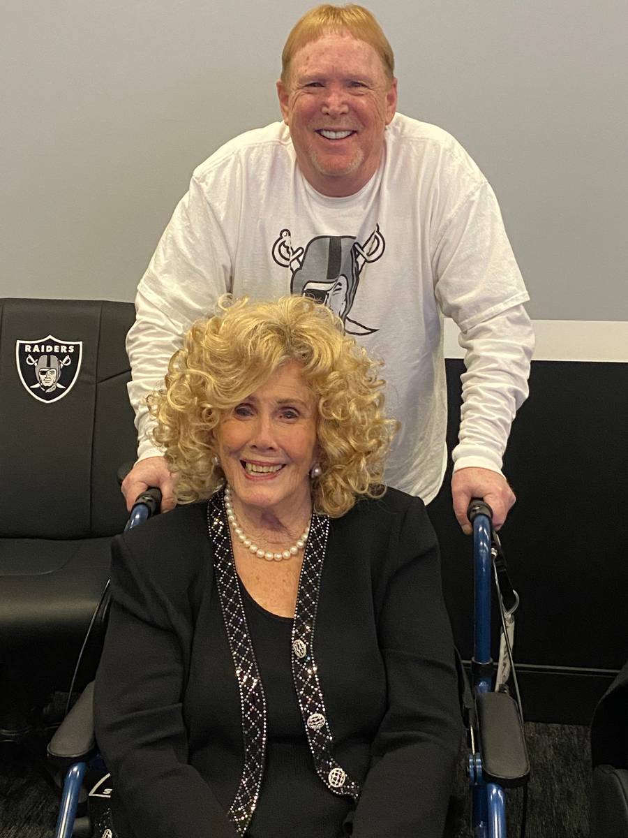 Mark Davis is shown with his mother, Carol, at Davis' Las Vegas Raiders opening watch party at ...