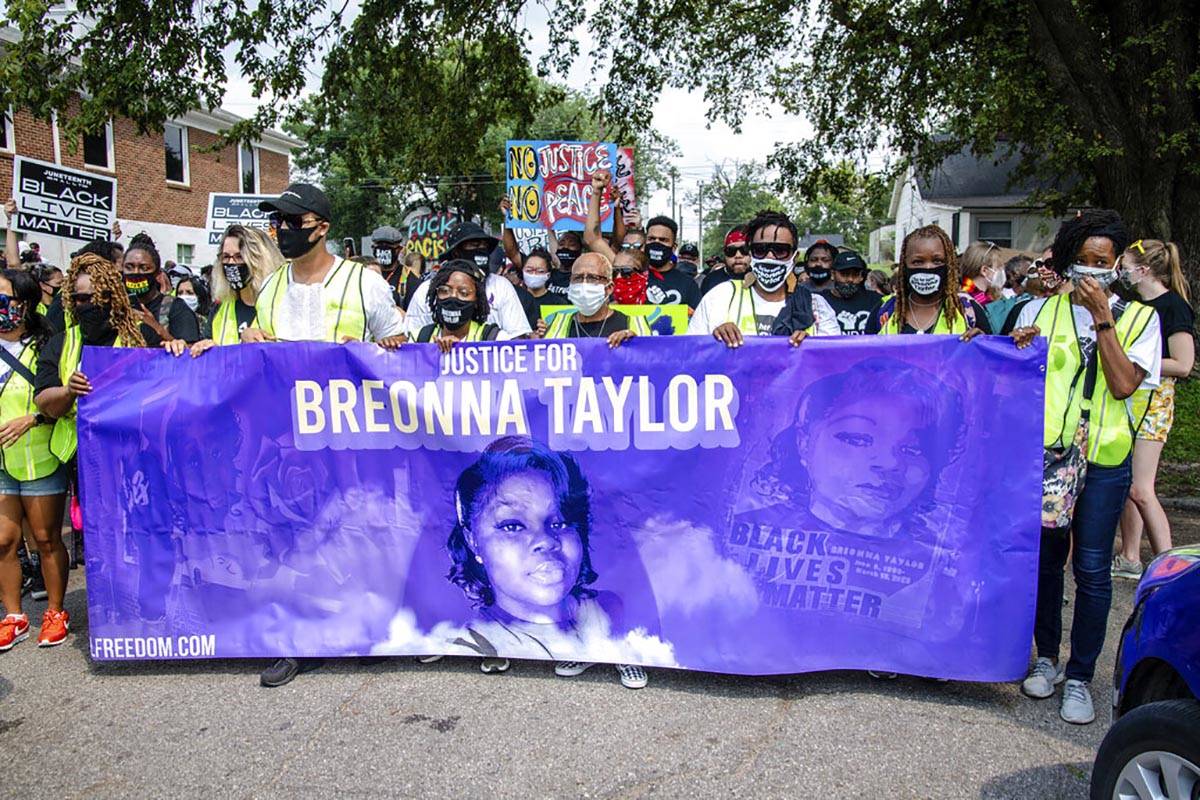 Protesters participate in the Good Trouble Tuesday march for Breonna Taylor, on Tuesday, Aug. 2 ...