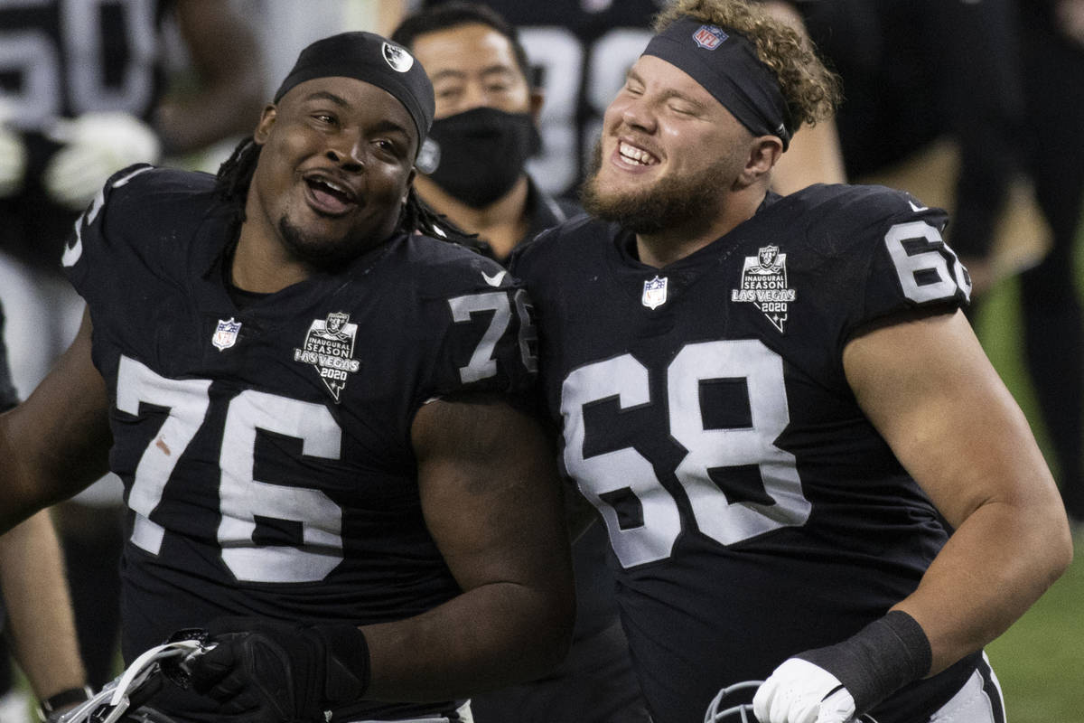 Las Vegas Raiders offensive tackle Andre James (68) celebrates with Las Vegas Raiders offensive ...