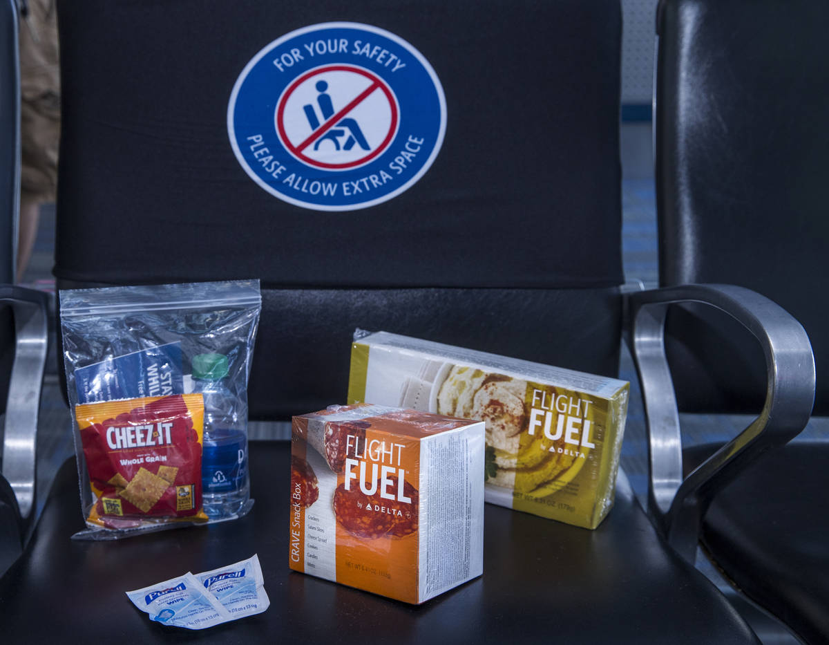 Delta Airlines offers pre-packaged food items as COVID-19 safety precautions are for flights de ...