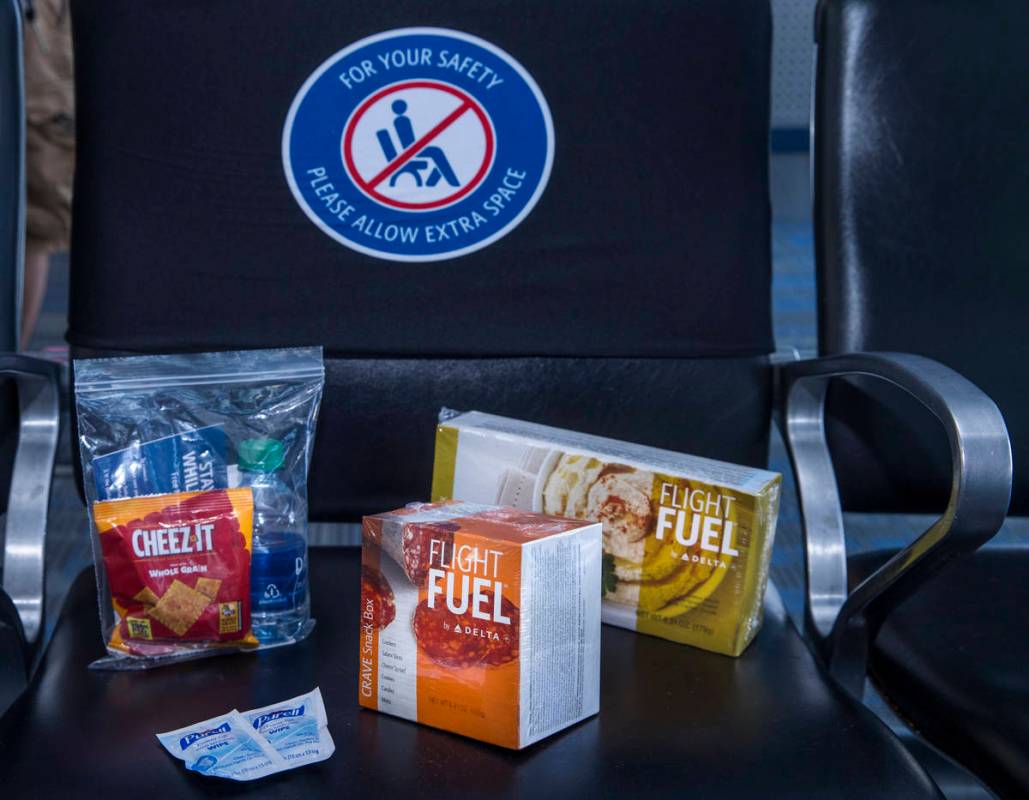 Delta Airlines offers pre-packaged food items as COVID-19 safety precautions are for flights de ...