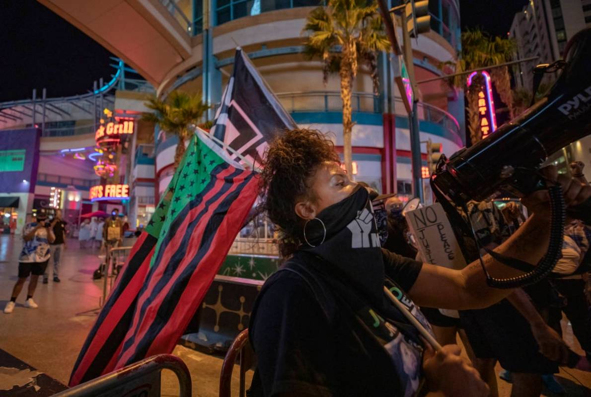 Demonstrator Sierra McDaniel, 24, of Las Vegas, leads protesters in honor of Breonna Taylor on ...