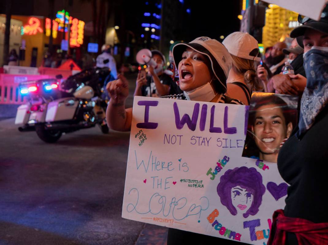 Demonstrator Sophia Sorn, 24, of Las Vegas, yell at law enforcement while protesting for Breonn ...