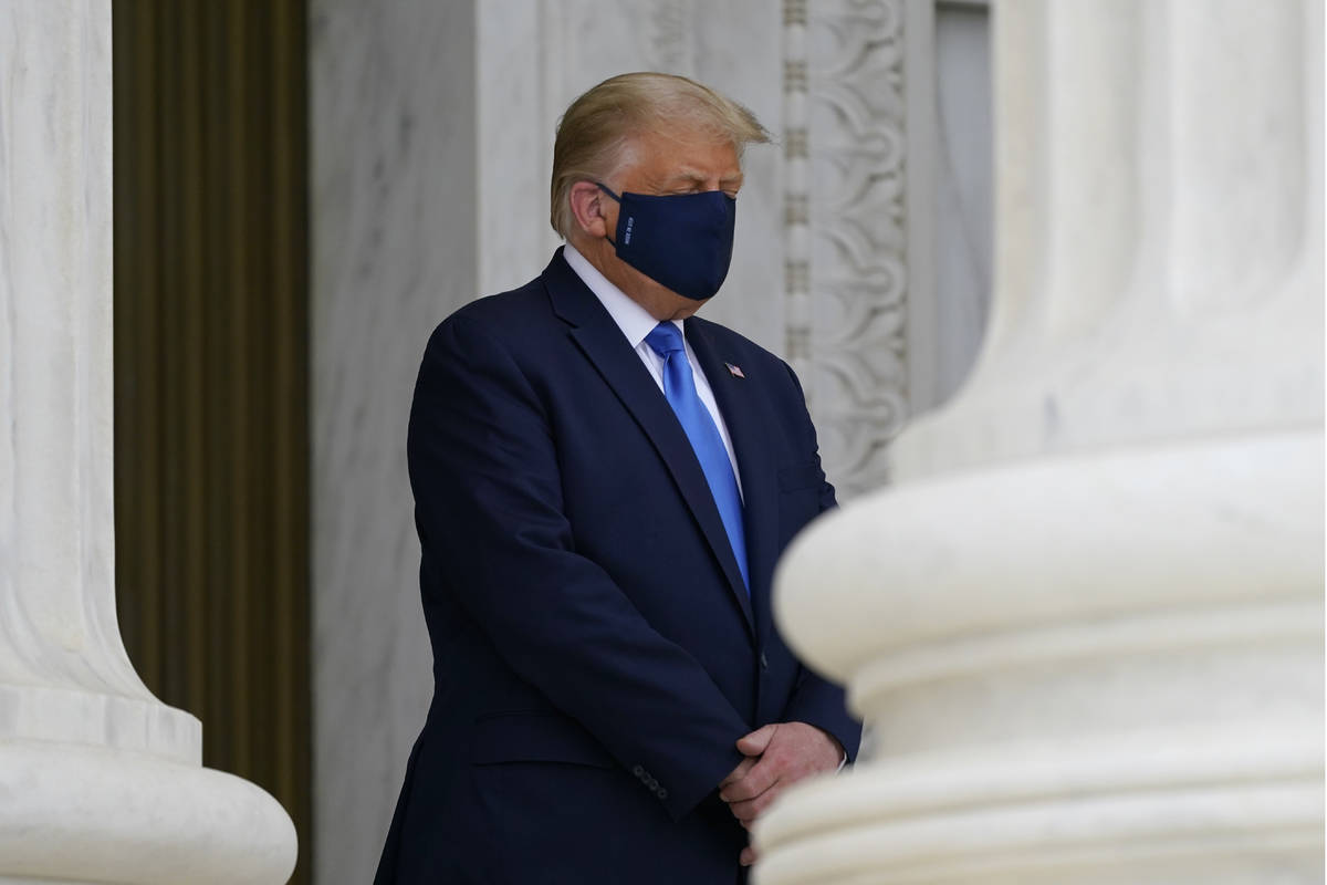 President Donald Trump pays respects as Justice Ruth Bader Ginsburg lies in repose under the Po ...