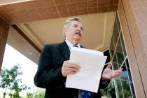 Former Las Vegas Review-Journal editor Thomas Mitchell holds a press conference outside the Gra ...