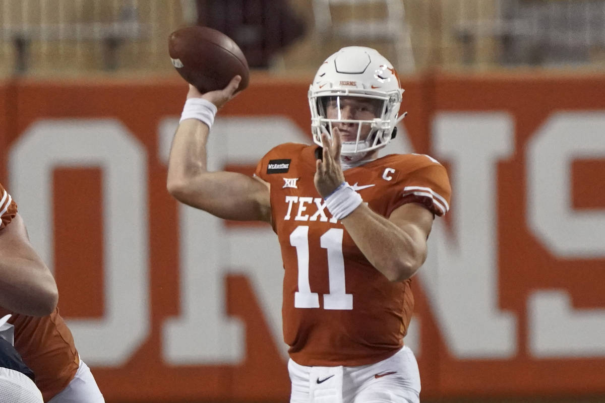 Texas' Sam Ehlinger (11) looks to pass against UTEP during the first half of an NCAA college fo ...