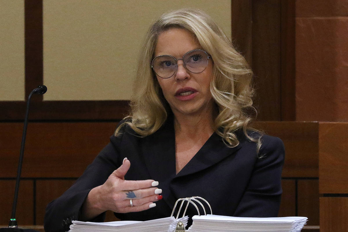 Justice of the Peace Melanie Tobiasson, left, testifies during a Nevada Judicial Discipline Com ...