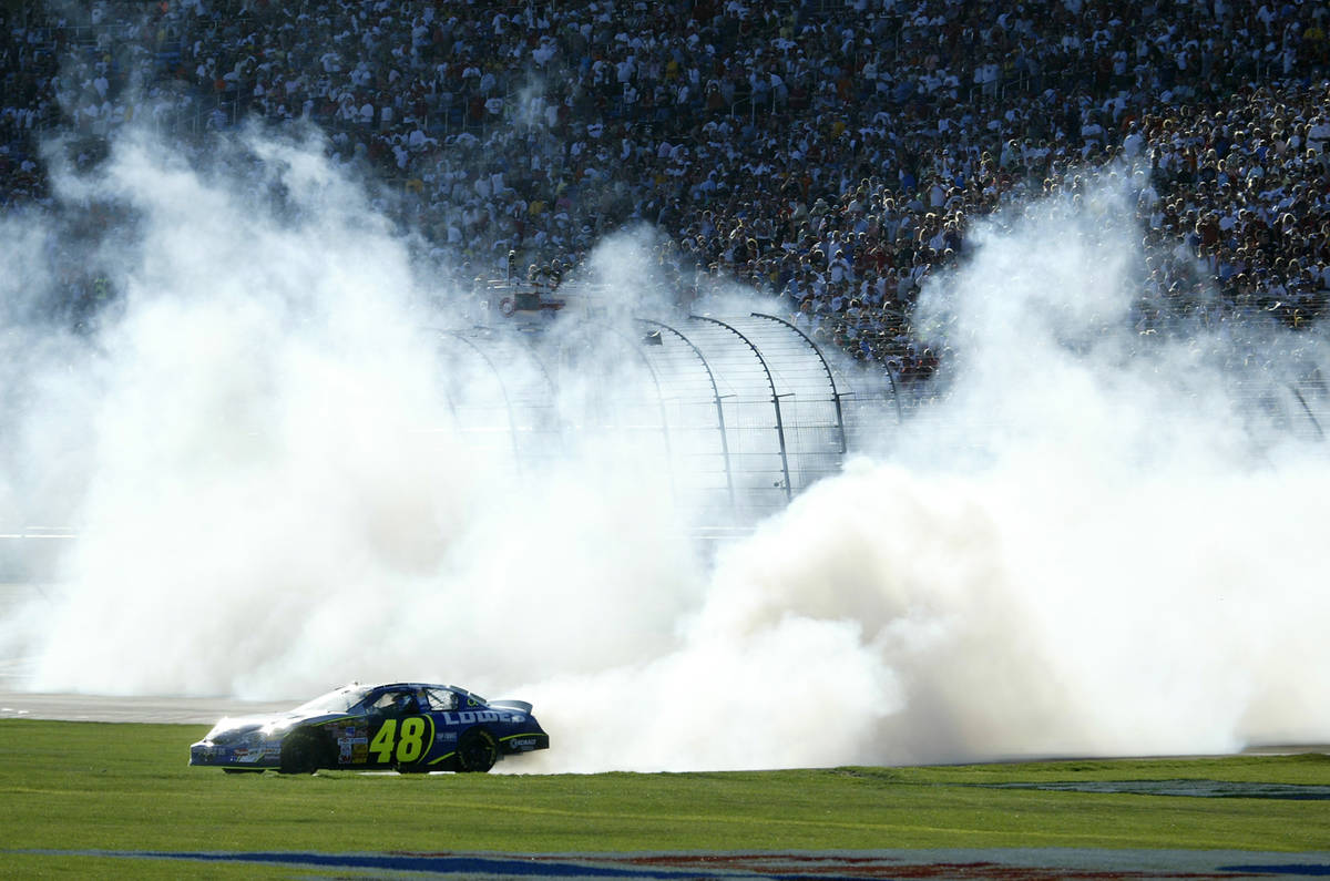 SAMANTHA CLEMENS/REVIEW-JOURNAL Jimmie Johnson burns out after winning the UAW-Daimler Chrysle ...