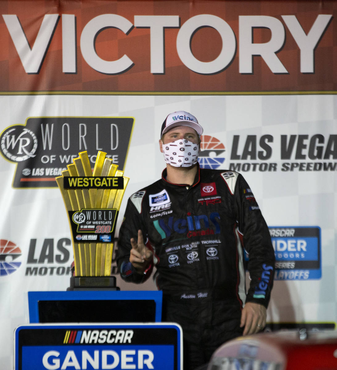 Austin Hill (16) poses in victory lane after winning the NASCAR Westgate 200 at Las Vegas Motor ...