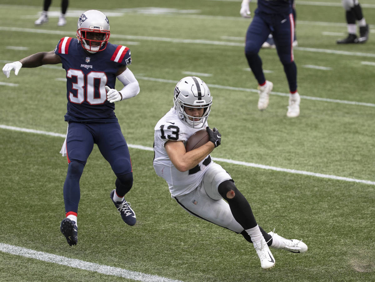 Las Vegas Raiders wide receiver Hunter Renfrow (13) leaps into the end zone past New England Pa ...