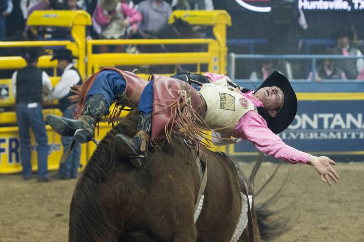 Tilden Hooper makes his run during National Finals Rodeo in 2018, at Thomas & Mack Center, in ...