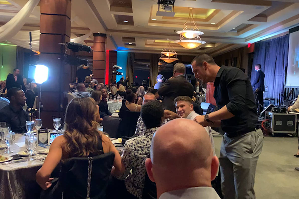 Derek Carr is seen mingling with others without a mask at Darren Waller's foundation event on M ...
