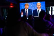 Supporters of President Donald Trump cheer during a debate watch party at Rhythm Kitchen in Las ...