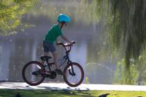 Riley Lowe, 7, rides his bike on a sunny morning at Cornerstone Park on Thursday, Oct. 1, 2020, ...