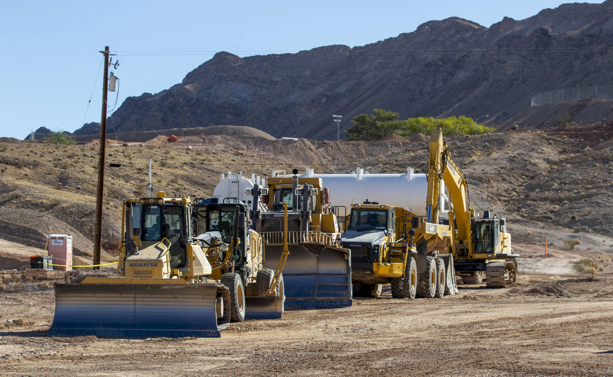 Construction vehicles are lined up on the new site of the Las Vegas Metropolitan Police Departm ...