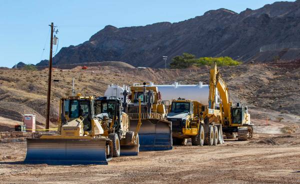 Construction vehicles are lined up on the new site of the Las Vegas Metropolitan Police Departm ...