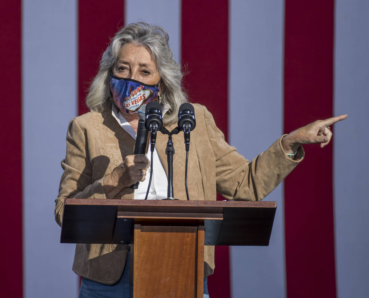 Rep. Dina Titus talks about Democratic vice presidential nominee Kamala Harris during a drive-i ...