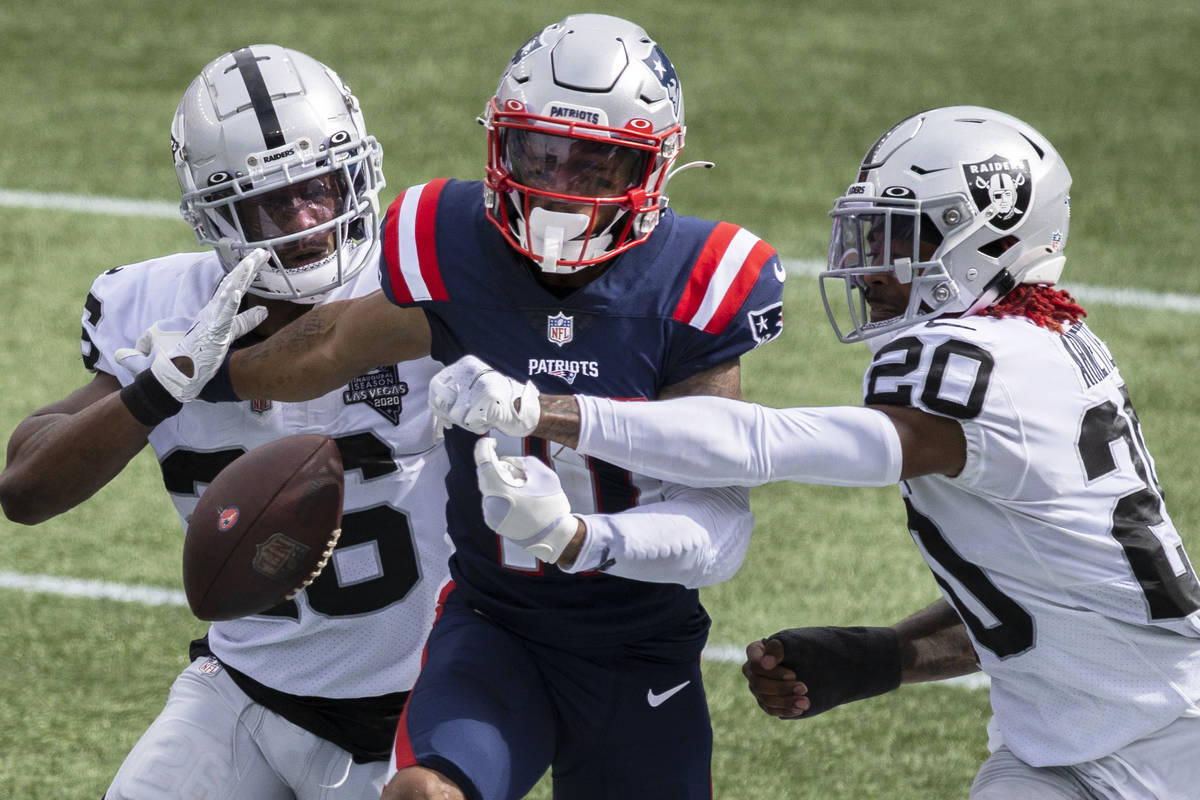 Las Vegas Raiders cornerback Nevin Lawson (26) and Las Vegas Raiders cornerback Damon Arnette ( ...