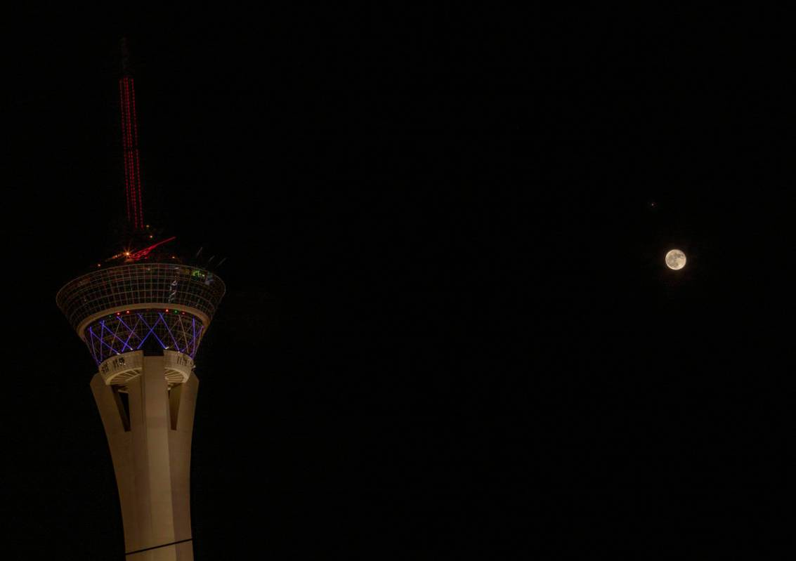 A glimpse of the moon and Mars seen above the Las Vegas Valley on Friday, Oct. 2, 2020. (Elizab ...