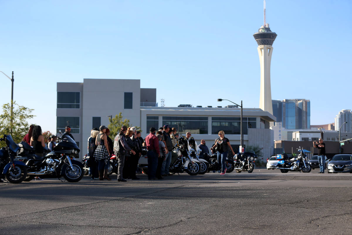 Motorcyclists participating in the Country Strong Foundation Route 91 Memorial Ride pose for a ...
