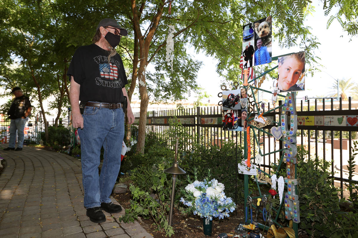 Gary Ryan of Henderson tours the Las Vegas Community Healing Garden after arriving with nearly ...