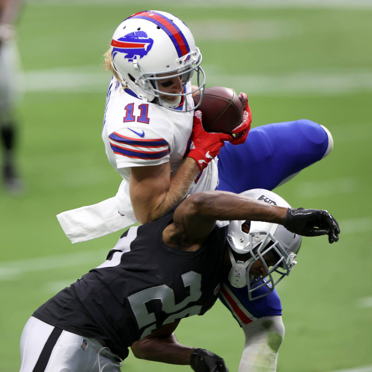 Buffalo Bills wide receiver Cole Beasley (11) makes a catch for a touchdown under pressure from ...