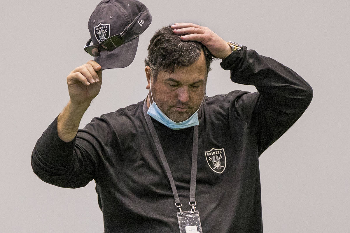 Las Vegas Raiders defensive coordinator Paul Guenther takes a moment to consider things during ...