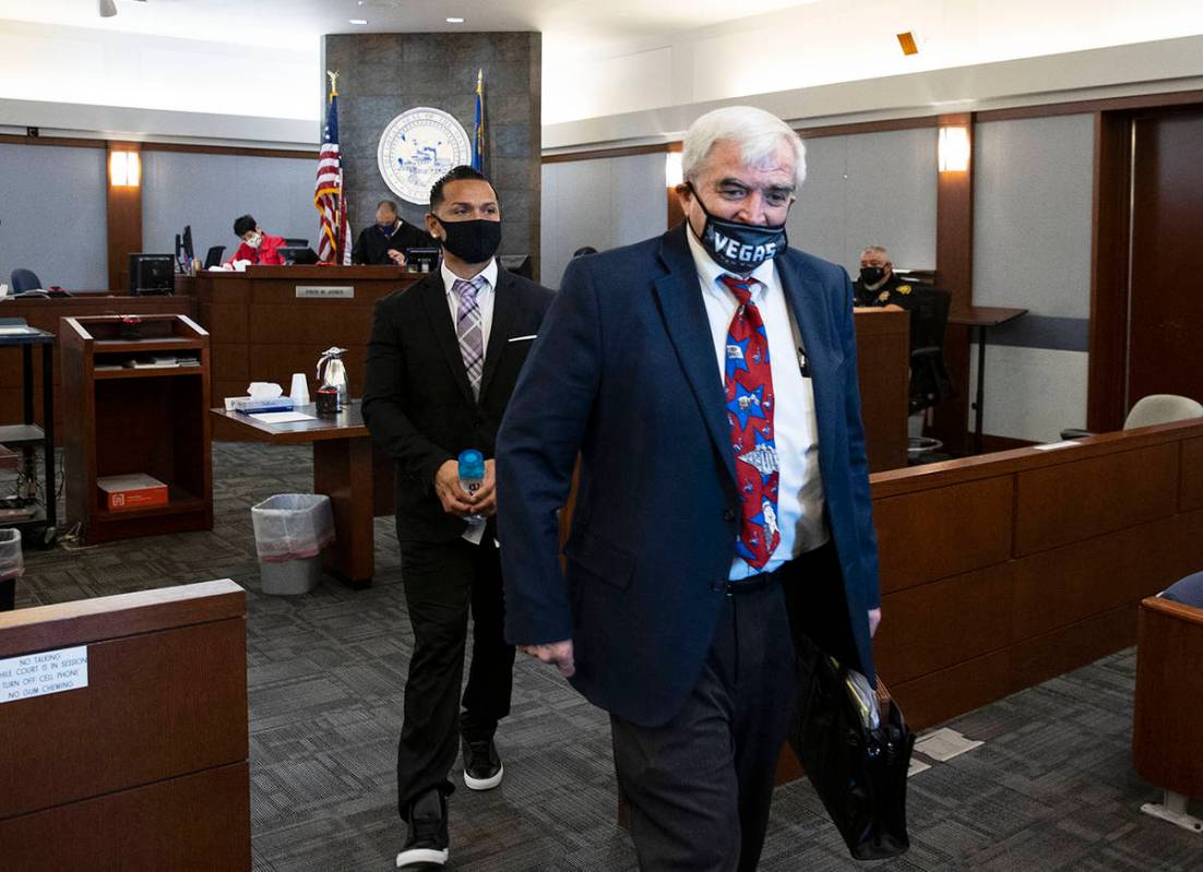 Ernesto Joshua Ramos, left, and his attorney Ian Christopherson, leave the courtroom at the Reg ...