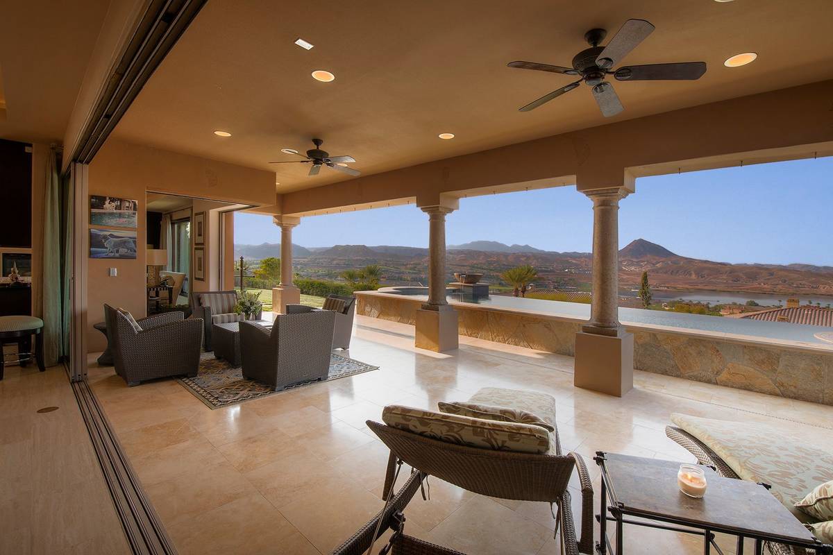 The covered patio is expansive. (Synergy Sotheby’s International Realty)