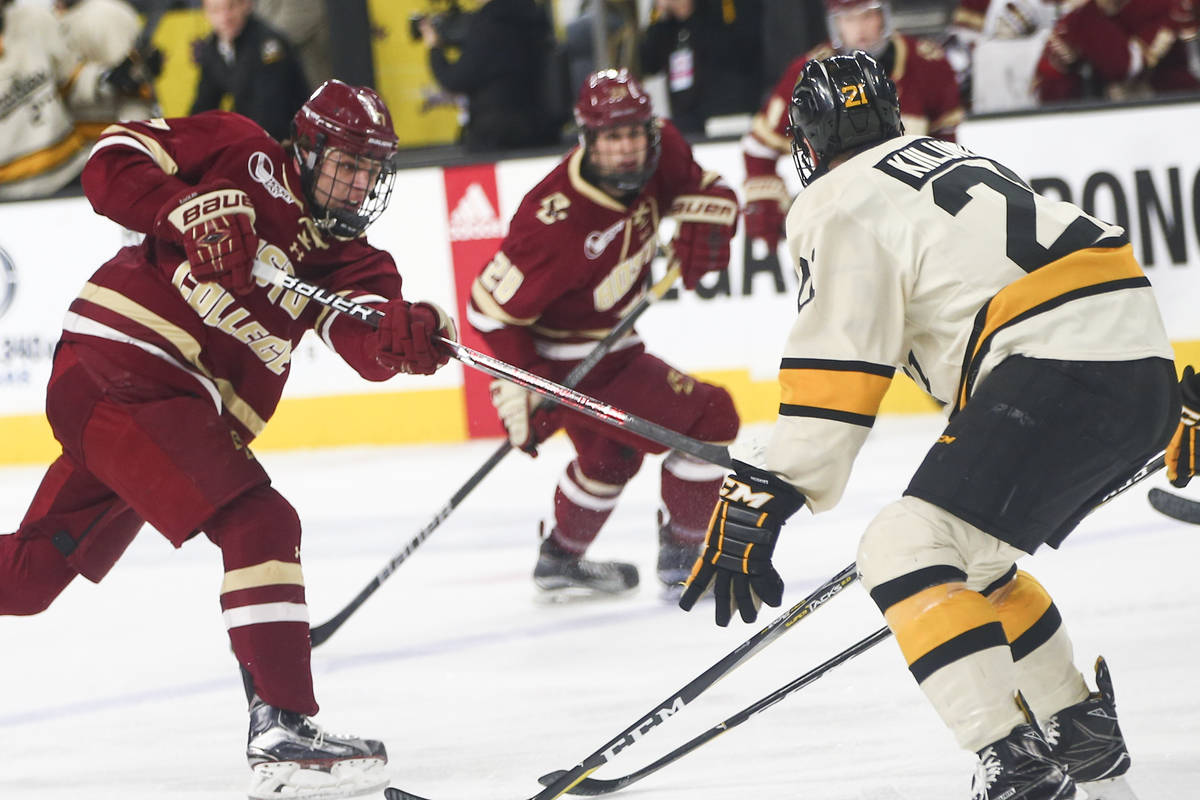 Boston College's Graham McPhee (27) attempts a shot against Michigan Tech during the Ice Vegas ...