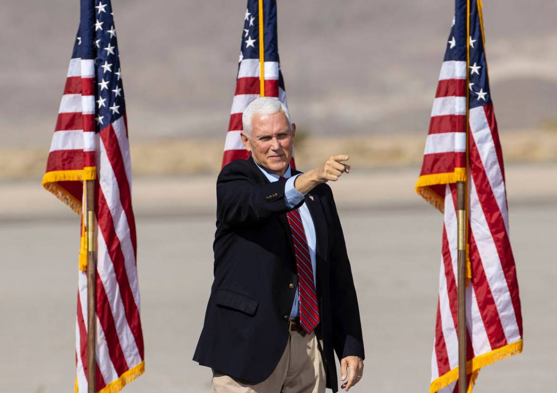 Vice President Mike Pence gestures toward the crowd during Make America Great Again event at Bo ...