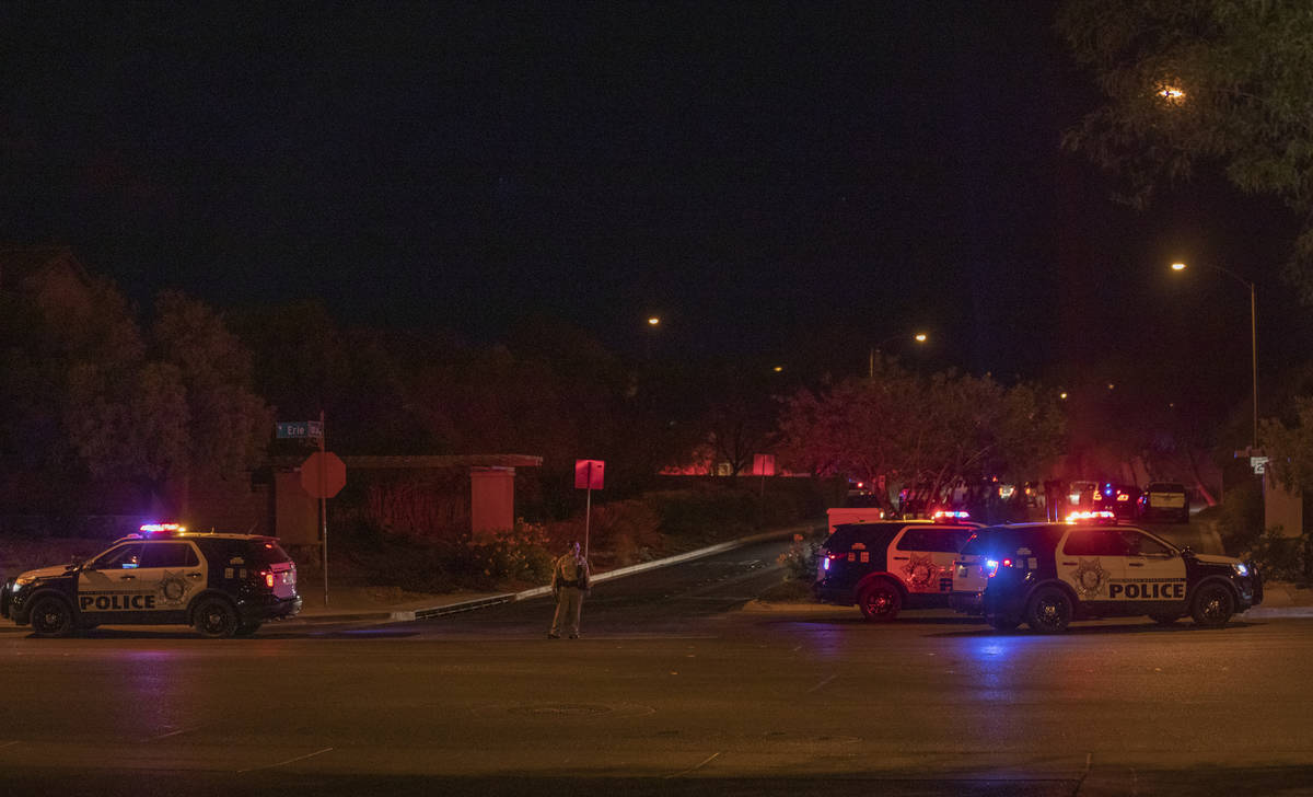 Las Vegas police are seen blocking West Erie Ave. and South Cochiti Lake St in Las Vegas, on Tu ...