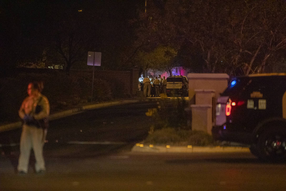 Las Vegas police are seen blocking West Erie Ave. and South Cochiti Lake St in Las Vegas, on Tu ...