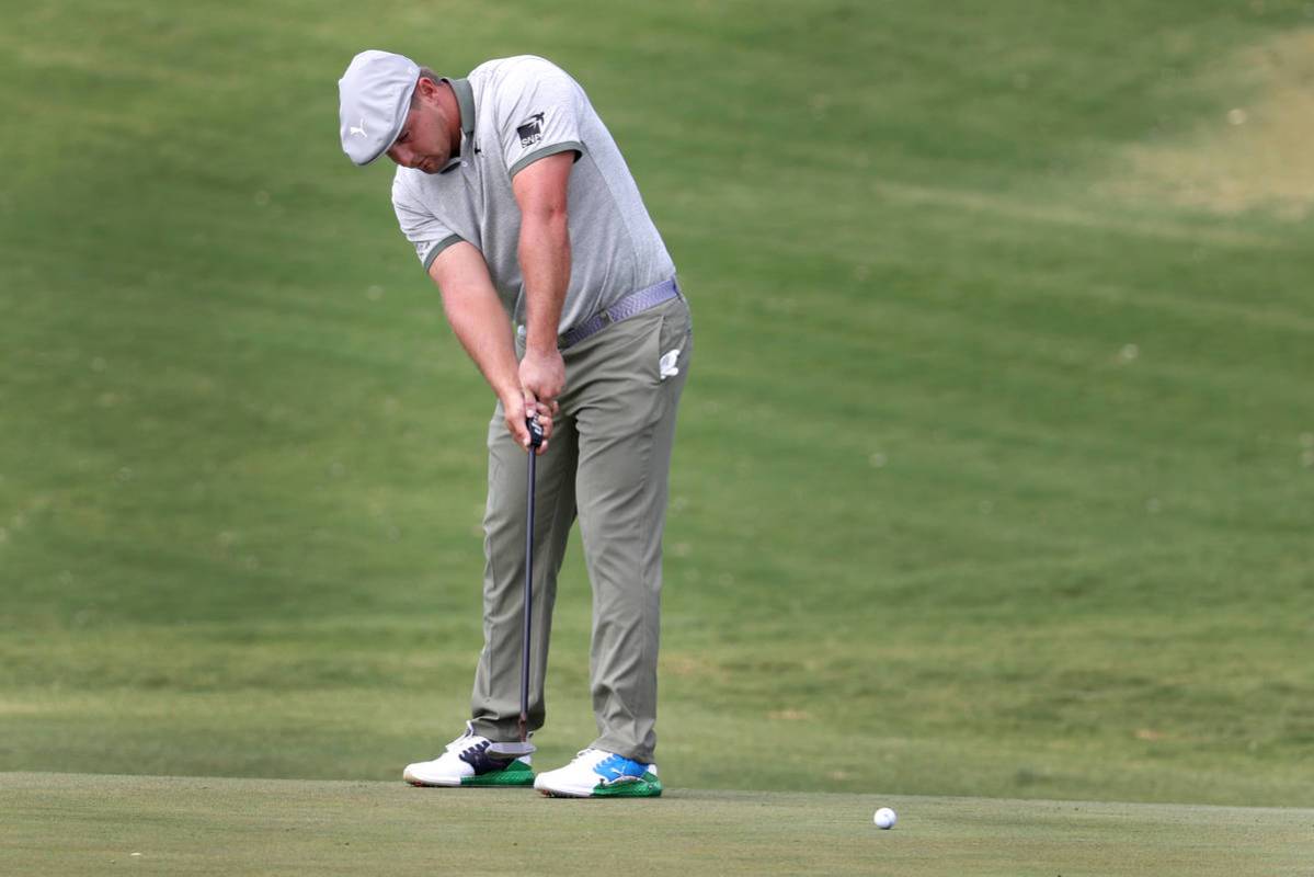 Bryson DeChambeau putts the ball at the fourth hole during round two of the 2020 Shriners Hospi ...