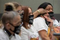 Victim Jennifer Ratay's friends Wendy Wilder, left, and Sharold McNeel, far left, listen as Chu ...