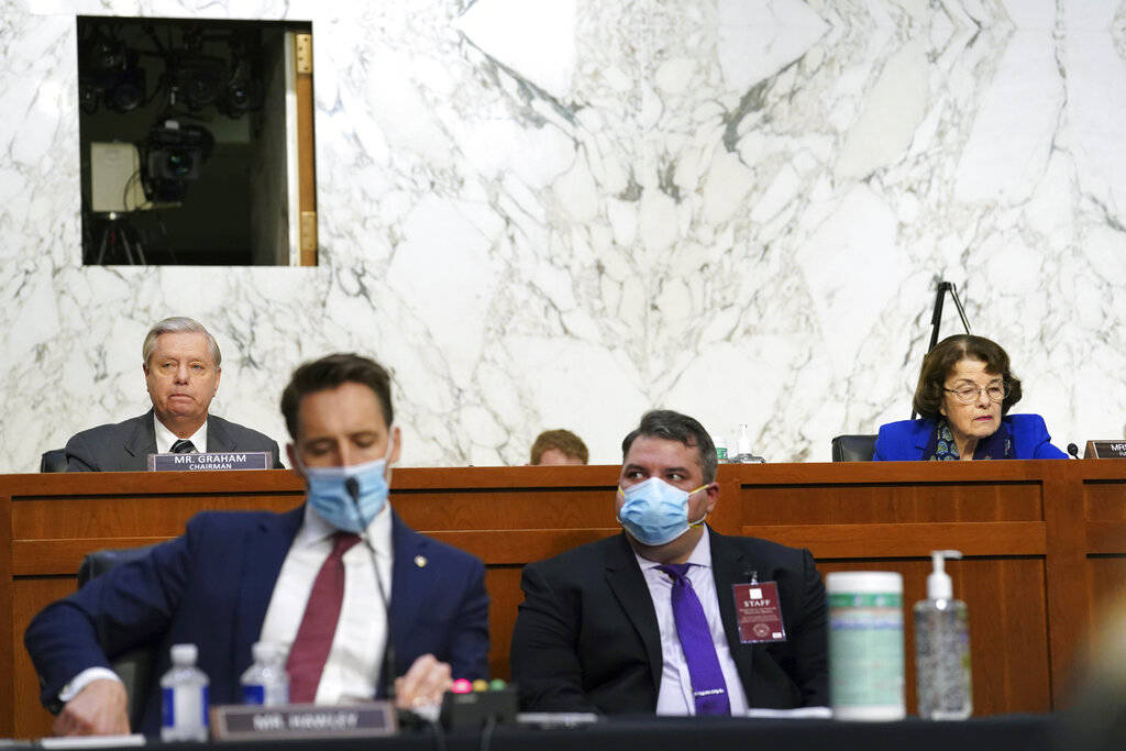 Sen. Lindsey Graham, R-S.C., left, and Sen. Dianne Feinstein, D-Calif., listen during a confirm ...