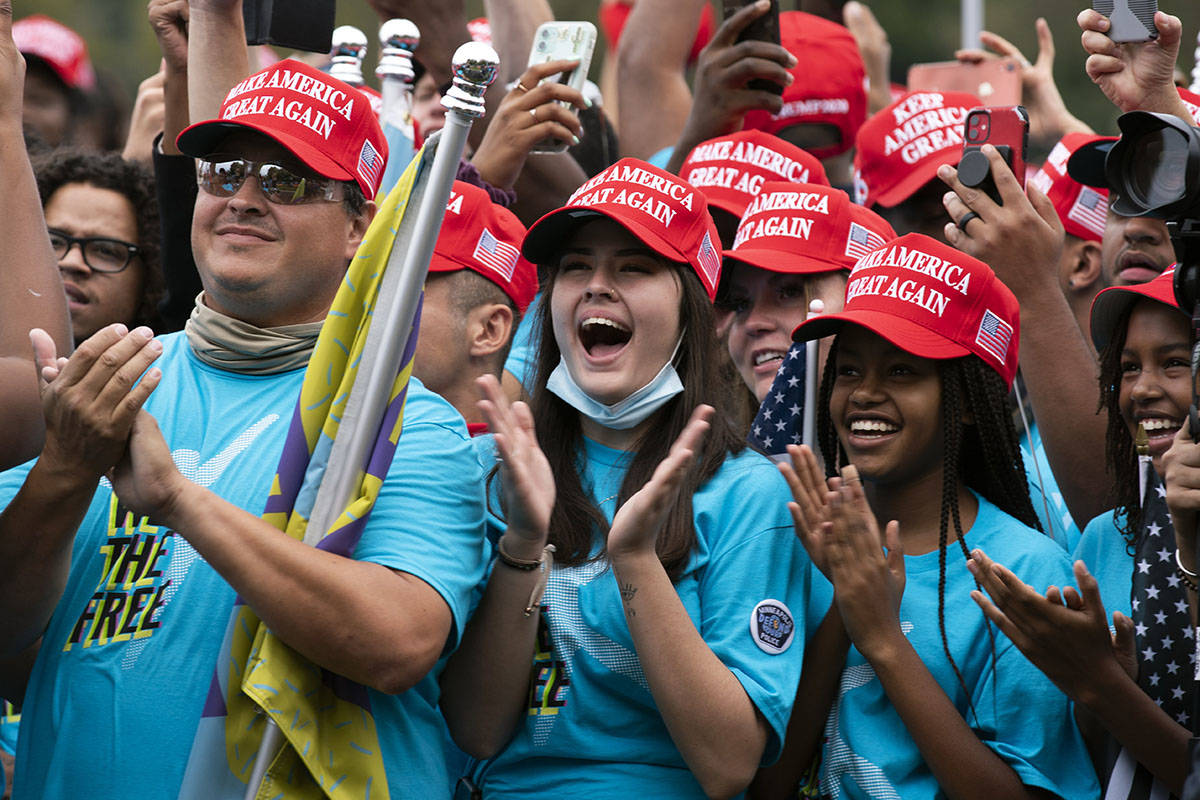 Supporters of President Donald Trump rally at The Ellipse, before entering to The White House, ...