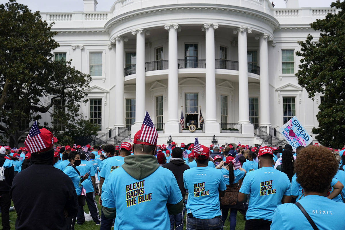 A crowd of President Donald Trump supporters gather on the South Lawn to listen to Trump speak ...