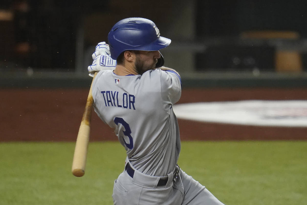 Los Angeles Dodgers' Chris Taylor bats in Game 3 of a baseball National League Division Series ...