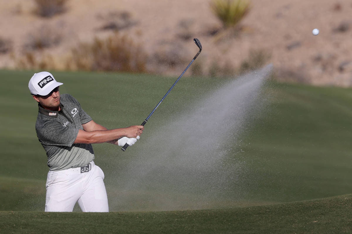 Austin Cook hits a bunker shot at the 15th hole during round three of the 2020 Shriners Hospita ...