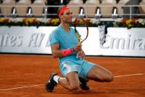 Spain's Rafael Nadal celebrates winning the final match of the French Open tennis tournament ag ...
